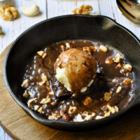sizzling brownie with ice cream and chocolate sauce.