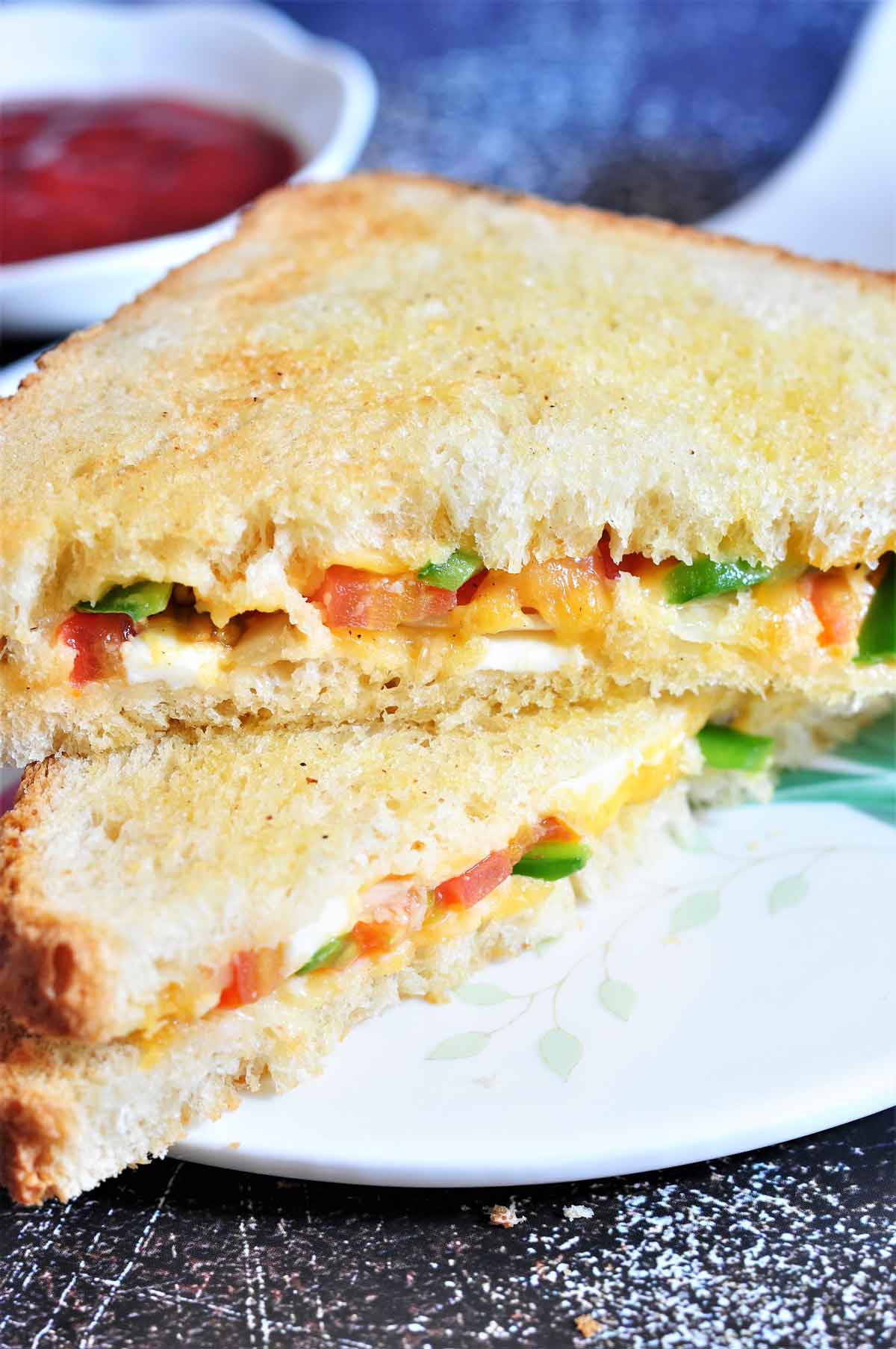 Veg Cheese Grilled Sandwich on a platter.