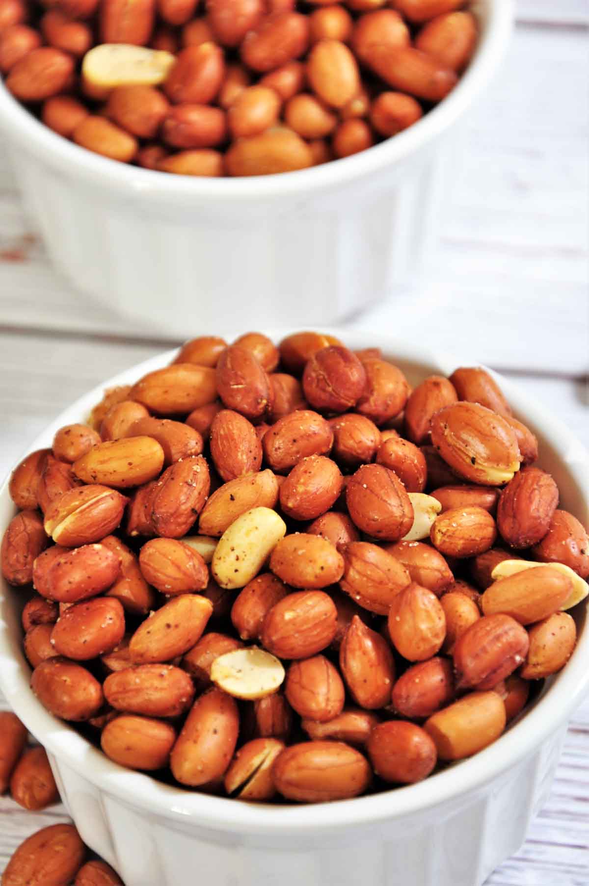 Roasted peanuts in a bowl.