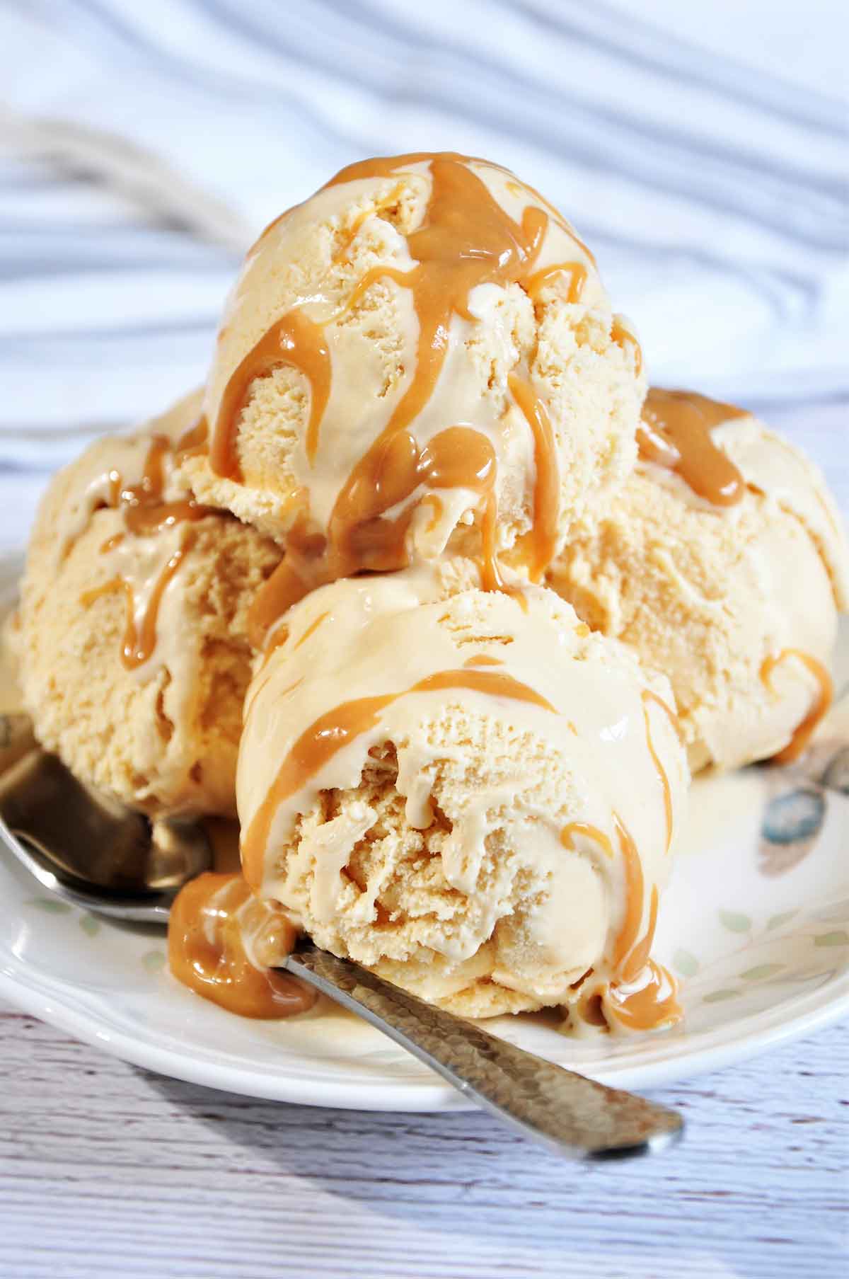 Salted Caramel ice-cream scoops in a plate.