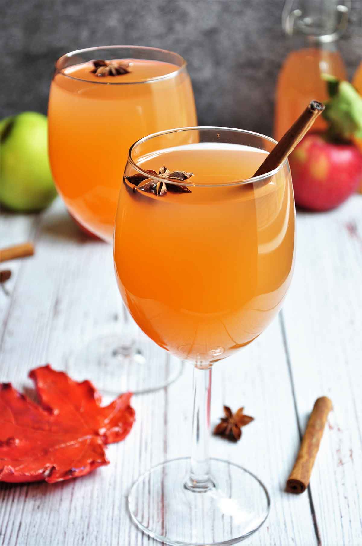 Apple Cider served in a medium size wine glass.