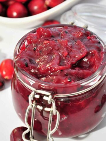 Cranberry chutney in a glass jar.