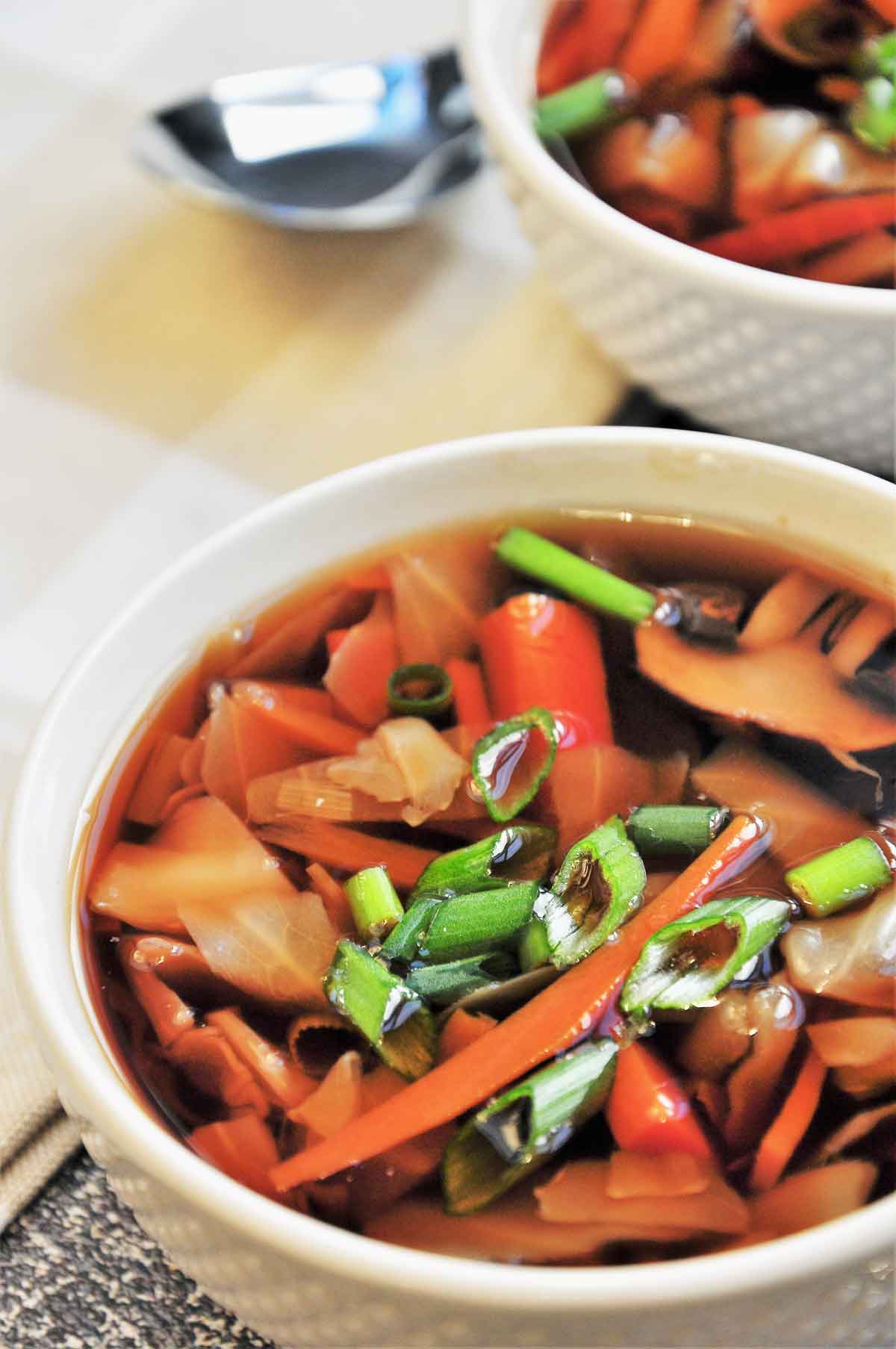 Hot and sour soup served in a bowl.
