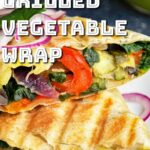 Grilled veggie wrap served in a plate.