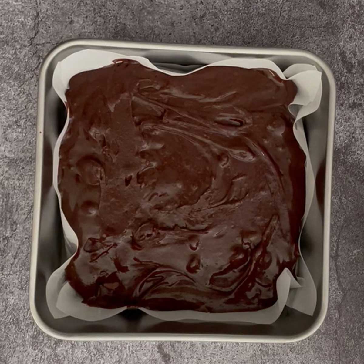 Brownie mix in pan.