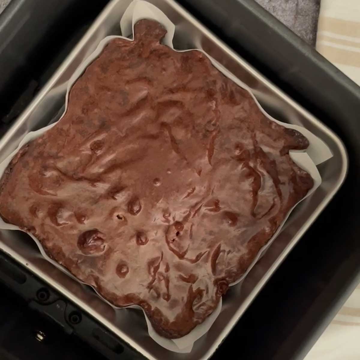 Brownie in air fryer pan.
