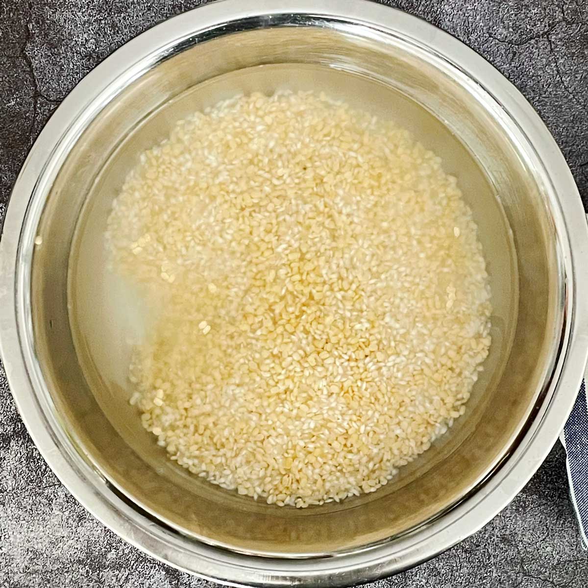 Rice and dal soaked for dosa batter.