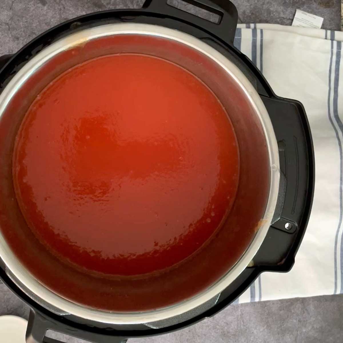 Simmer Tomato ketchup in instant pot.
