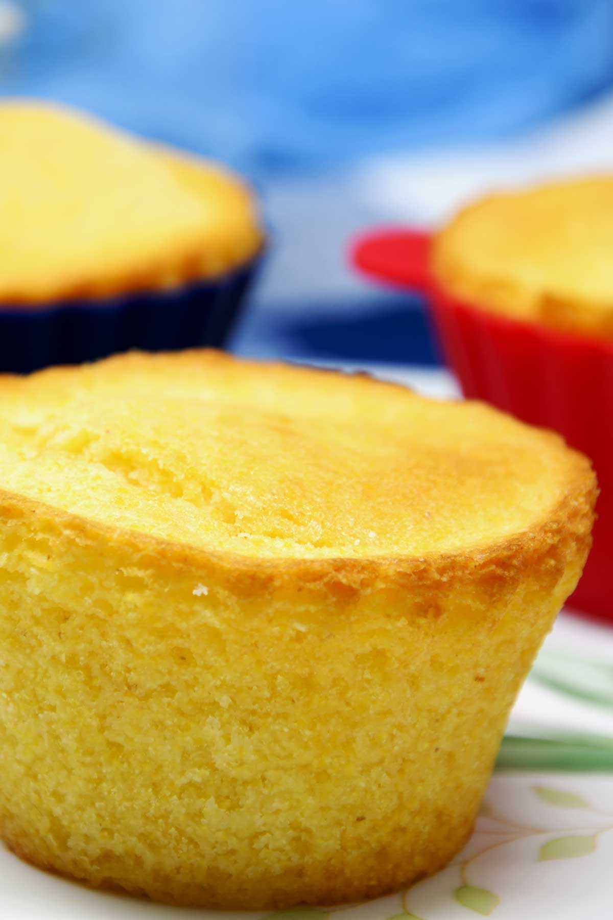 Corn bread muffins served on cheese board.