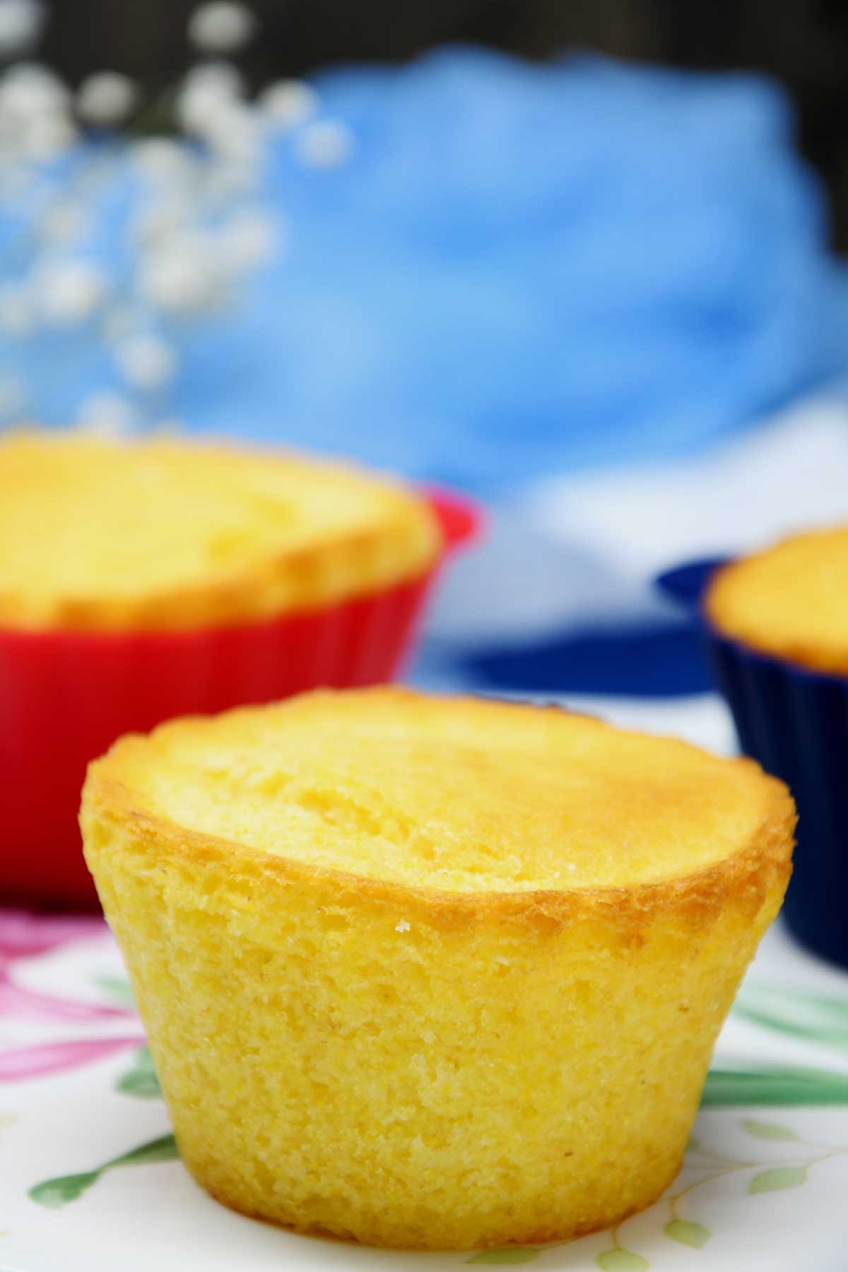 Corn bread muffins served on cheese board.
