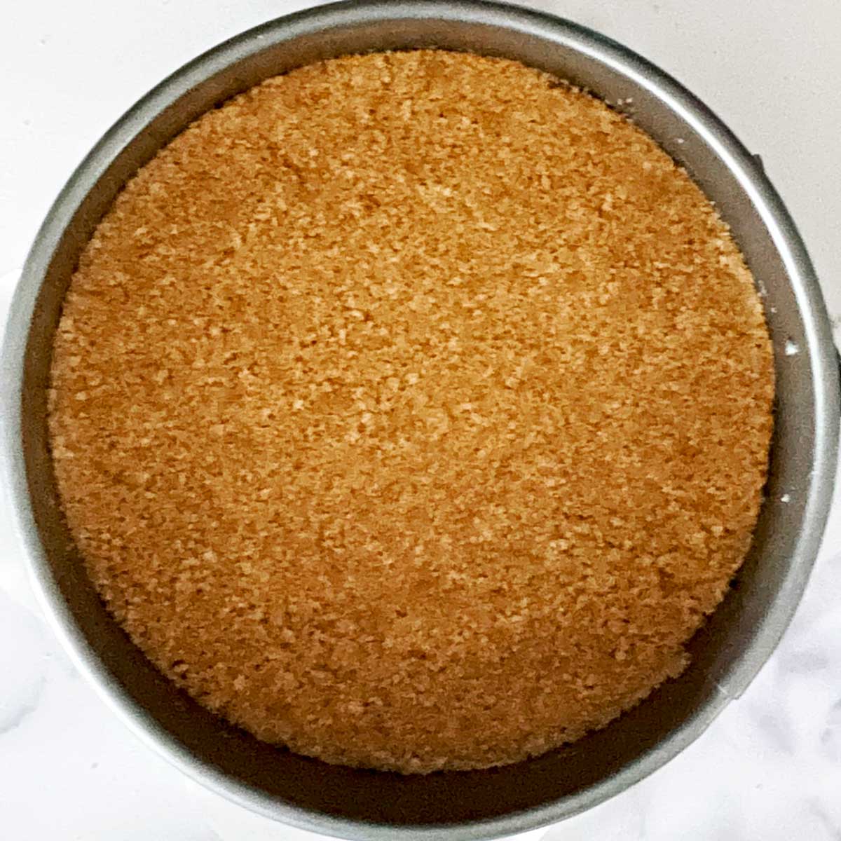 Crushed crackers layer for Air fryer cheesecake.