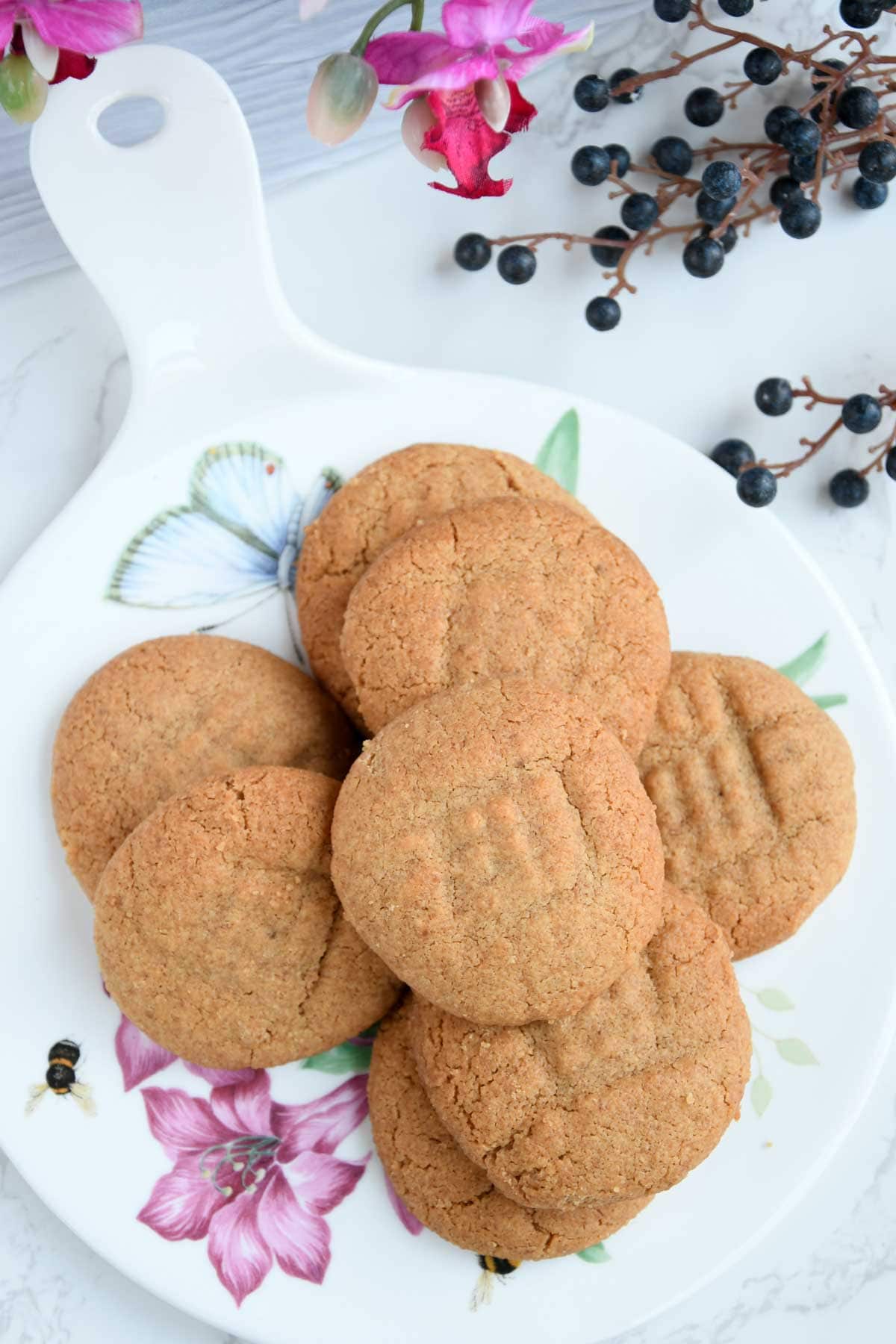Peanut butter cookies served on a cheese board.