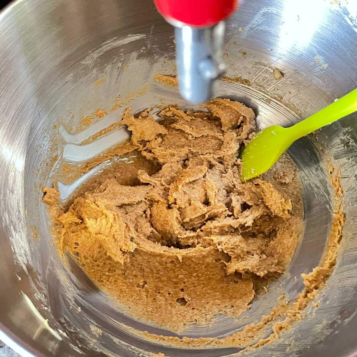 Sugar butter mix for Peanut butter cookie in stand mixer.