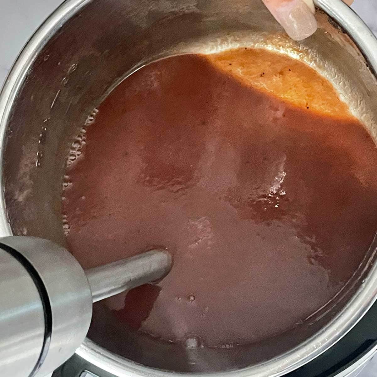 Tamarind dates chutney blending in instant pot.