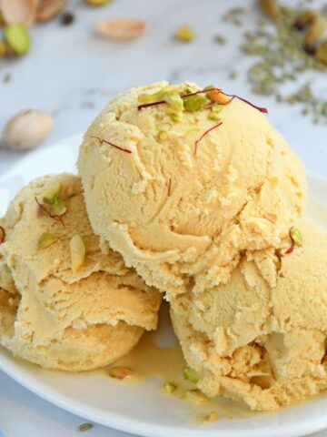 Thandai ice cream scoops in a plate.