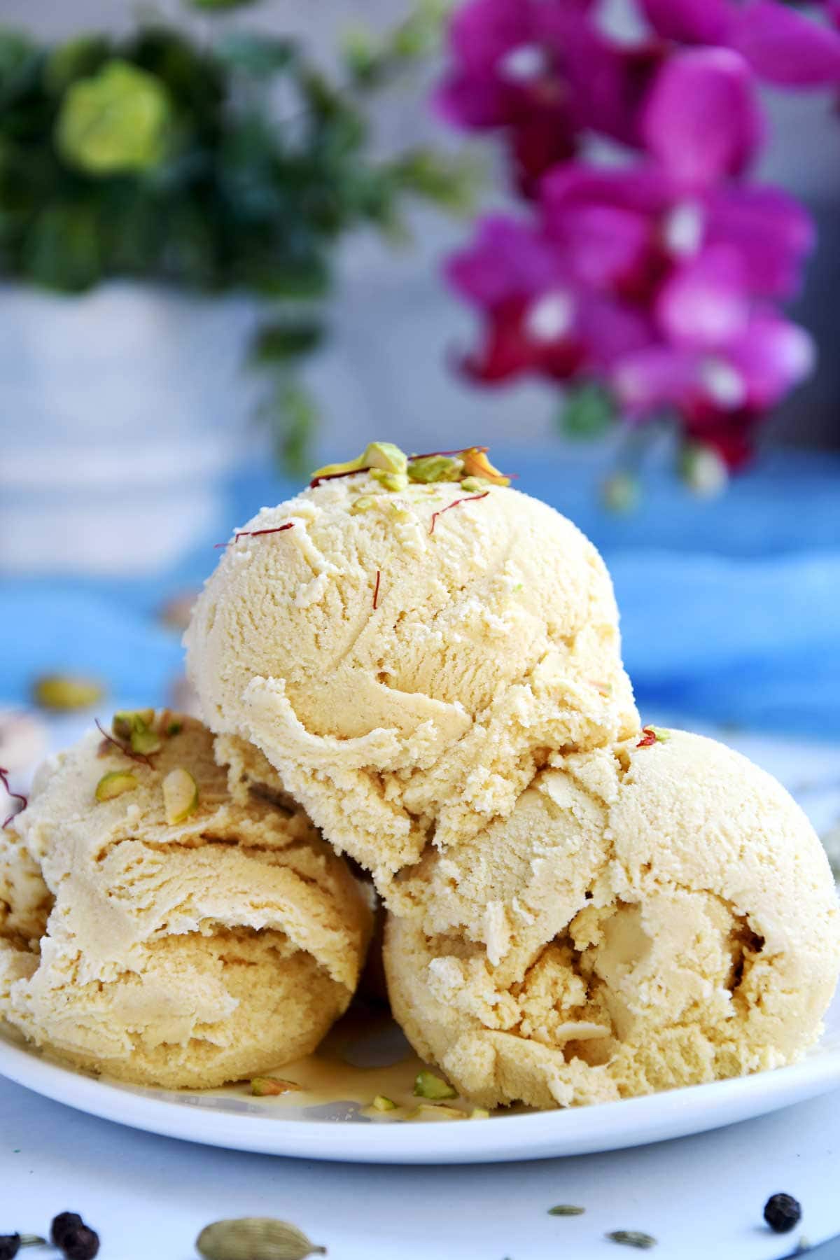 Thandai ice cream scoops in a plate.