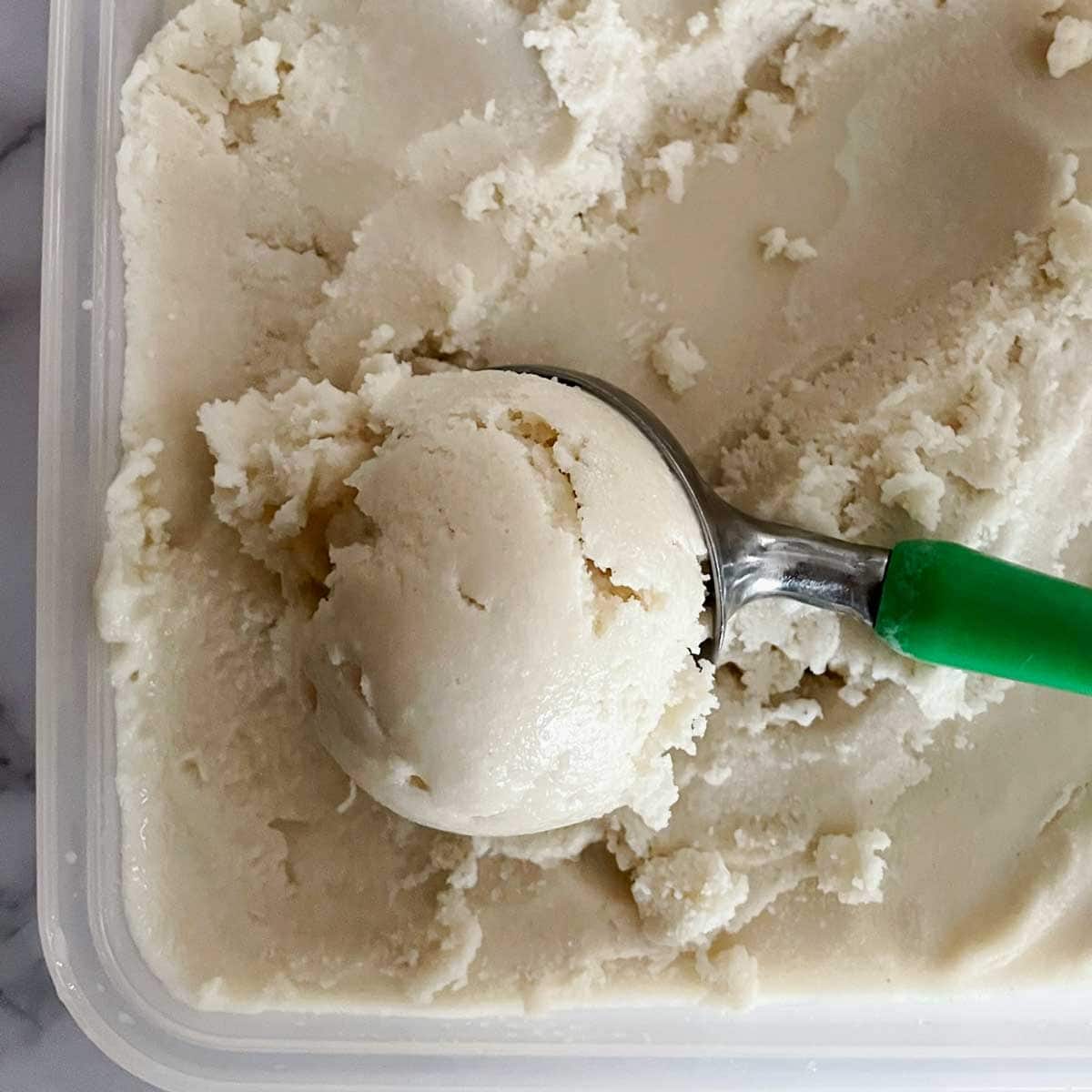 Vegan vanilla ice cream scoop.