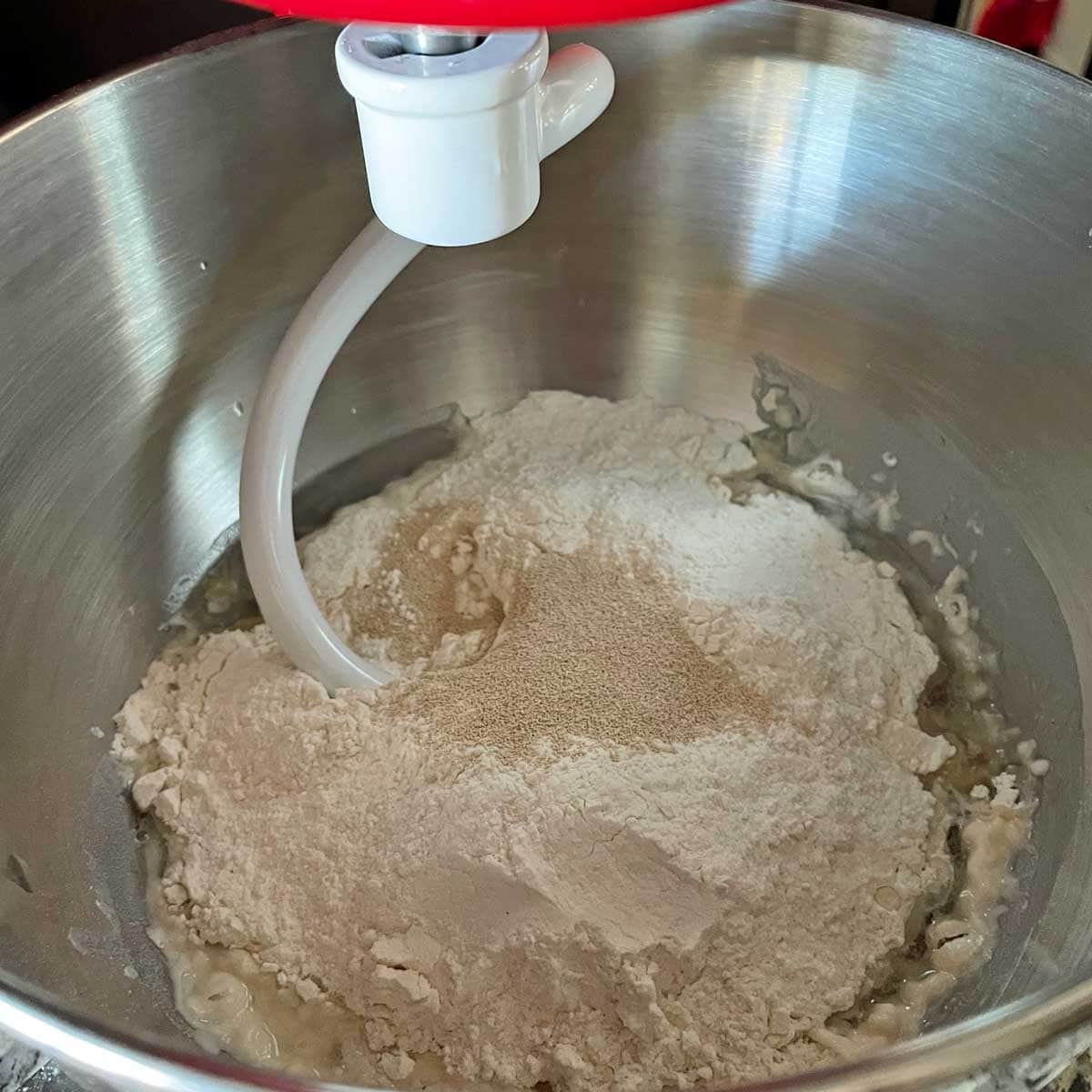 Pizza dough making in stand mixer.