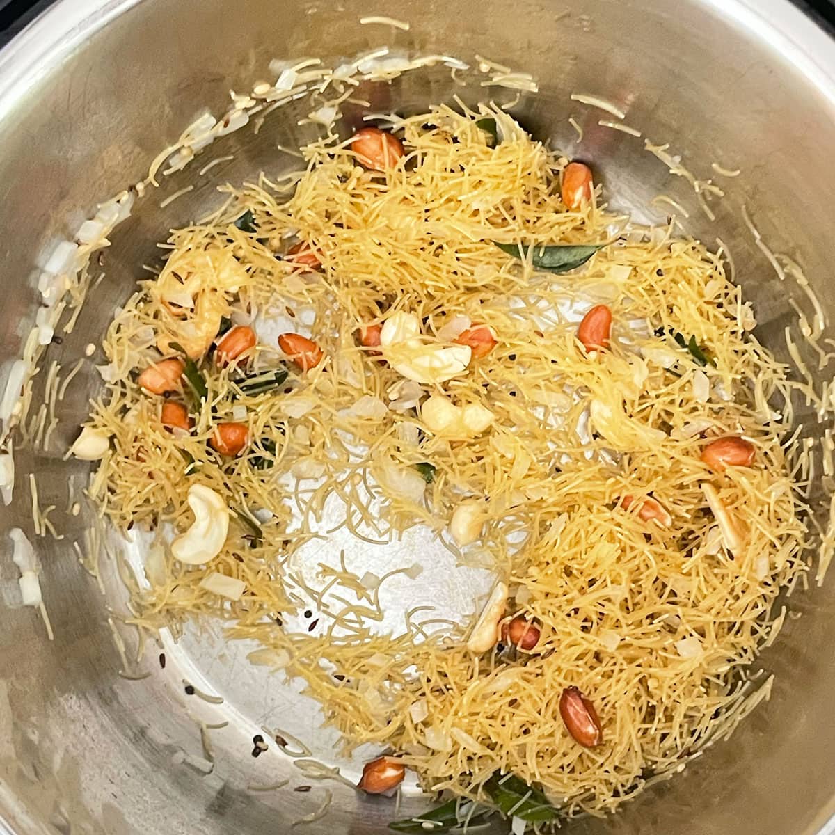 Sauted ingredients for Vermicelli Upma.