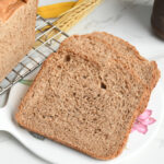 Wheat bread slices on a platter.