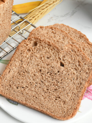 Wheat bread slices on a platter.