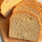 Bread slices on a serving board.